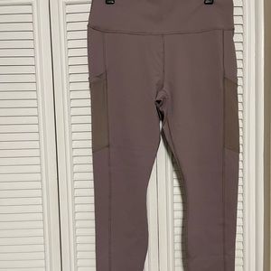 Fabletics tan Powerhold legging with outside mesh pockets